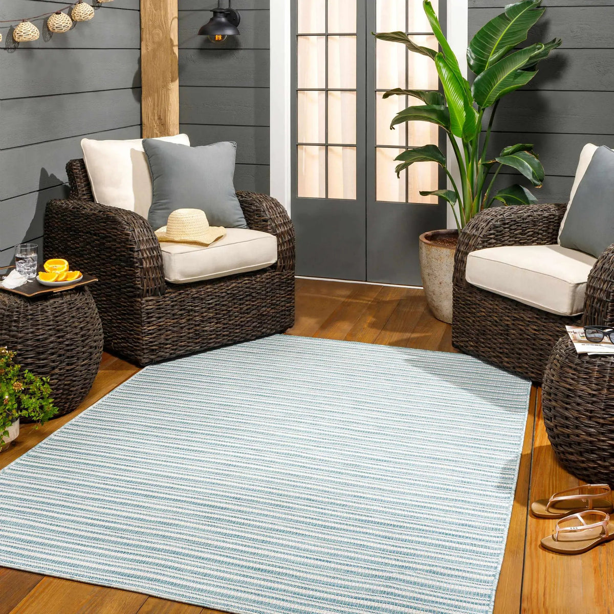 Greg Teal Outdoor Area Rug - Clearance, installed in a room