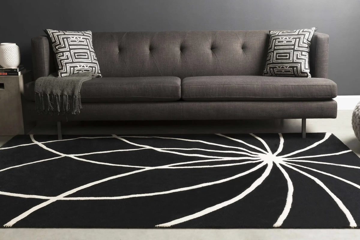 Davison Black Geometric Wool Carpet, installed in a room