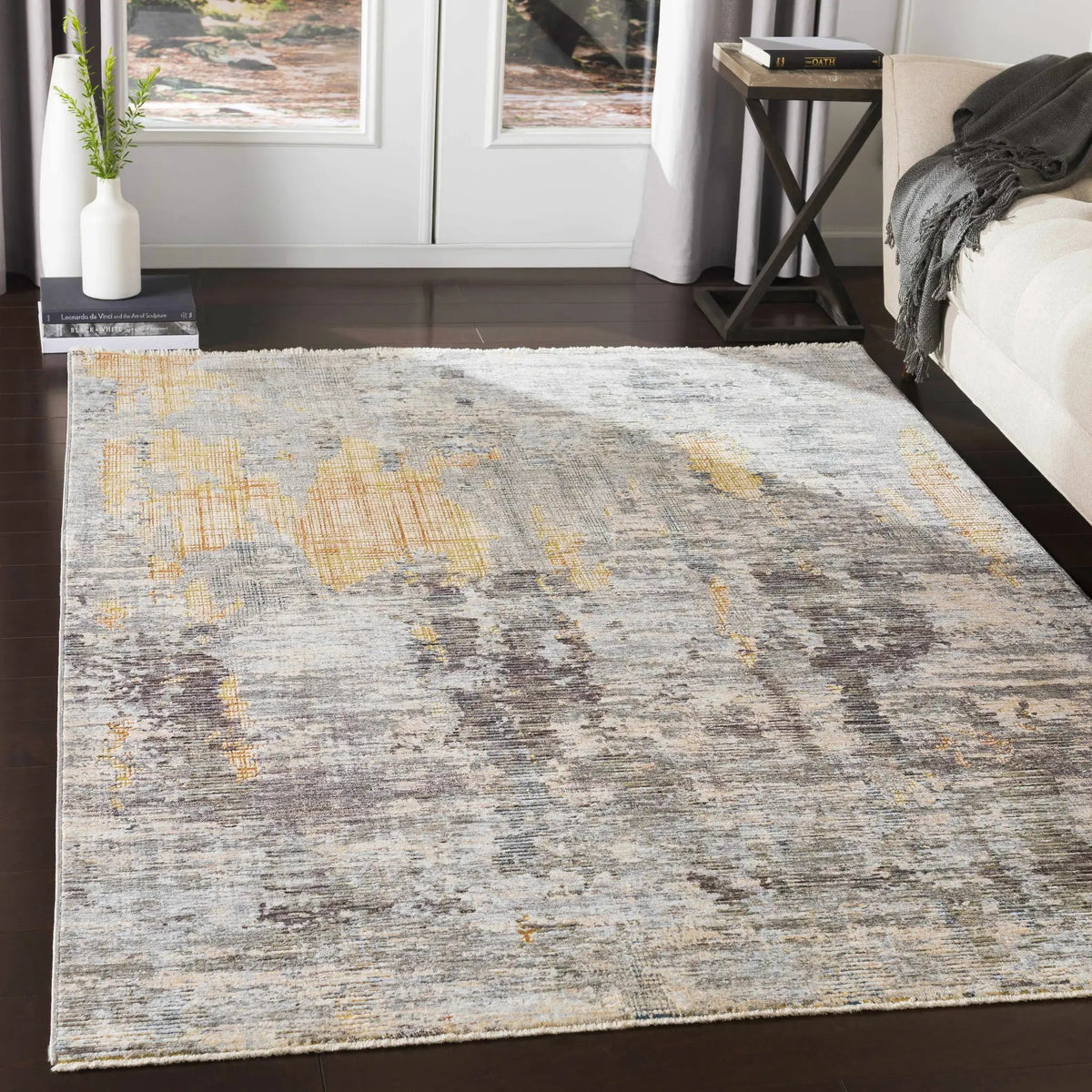 Hustontown Carved Statement Rug, installed in a room