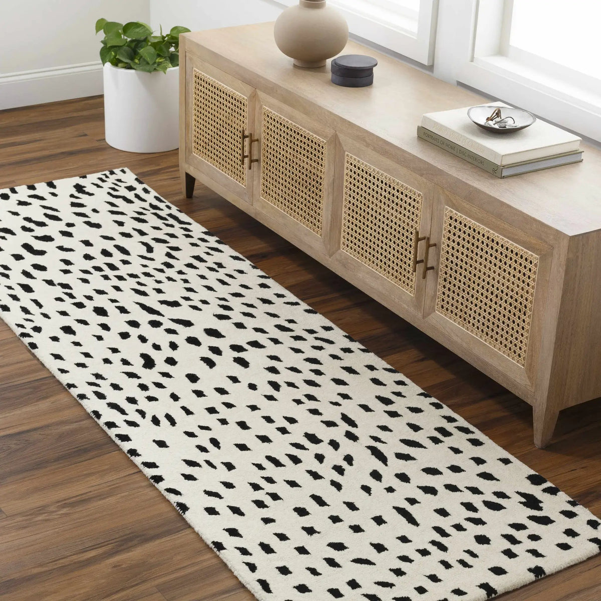 Athena White Giraffe Print Wool Rug, installed in a room 2