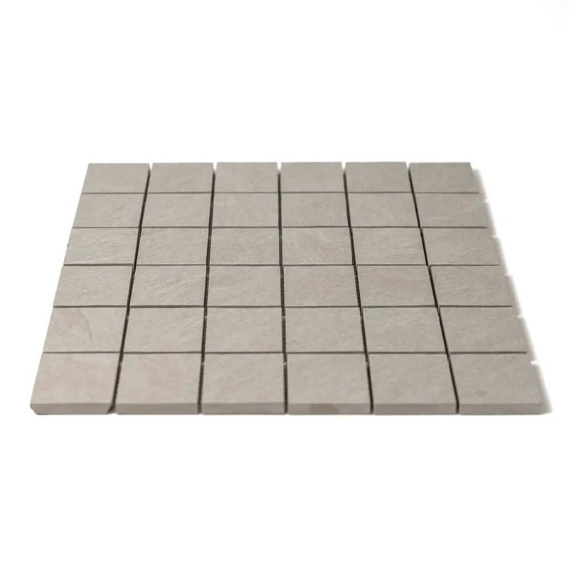 Ivory Flow Natural Matte Herringbone 5/8x3 Porcelain Mosaics 10 7/16x12 13/16 by Stonetiledepot