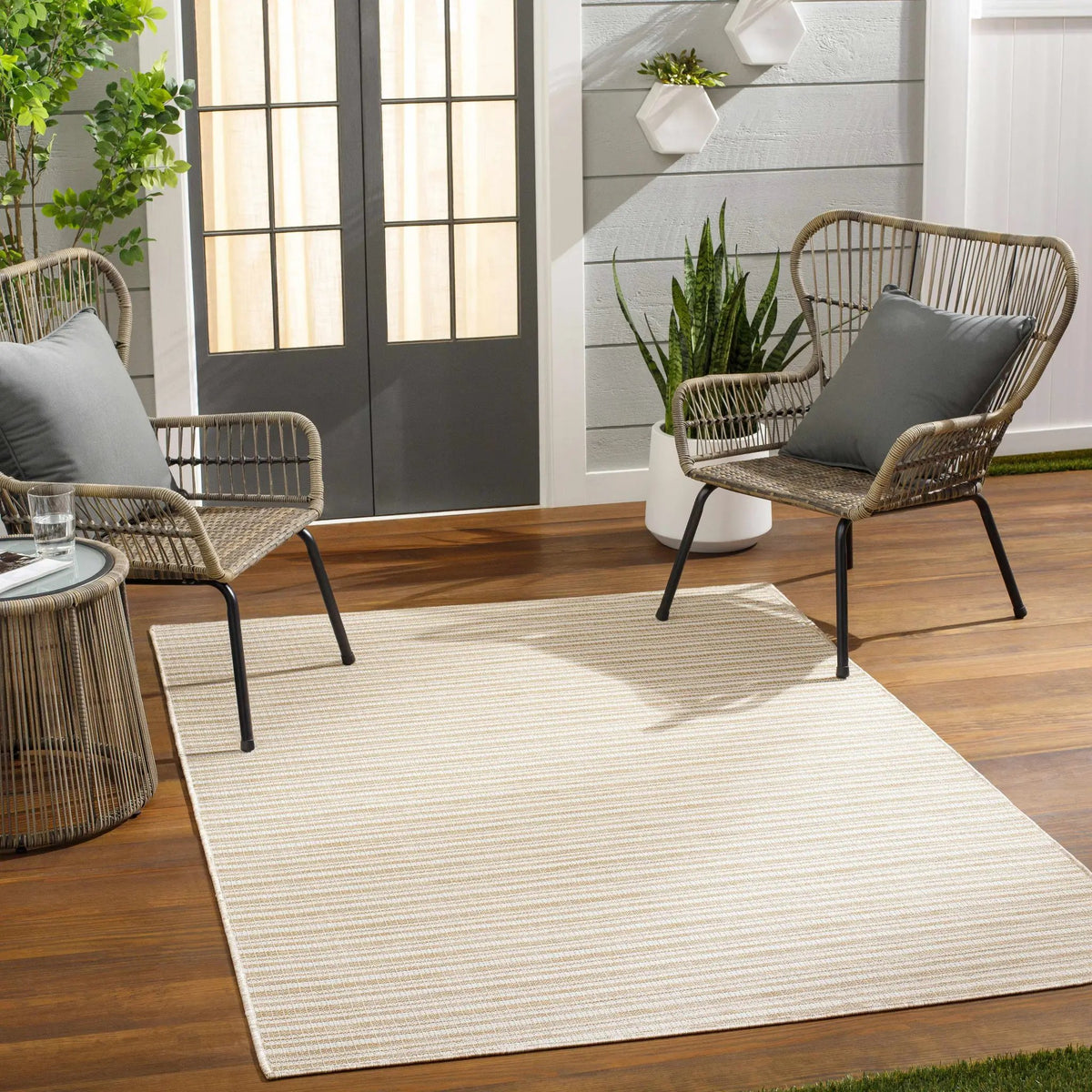 Greg Beige Outdoor Area Rug - Clearance, installed in a room