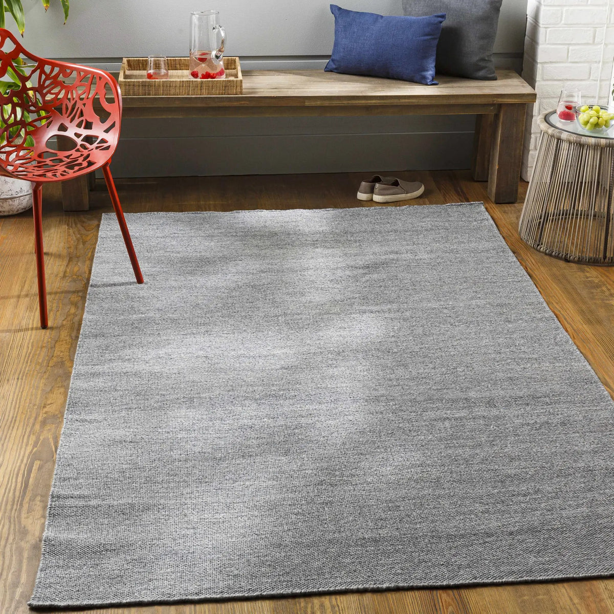 Junortoun Area Rug - Clearance, installed in a room