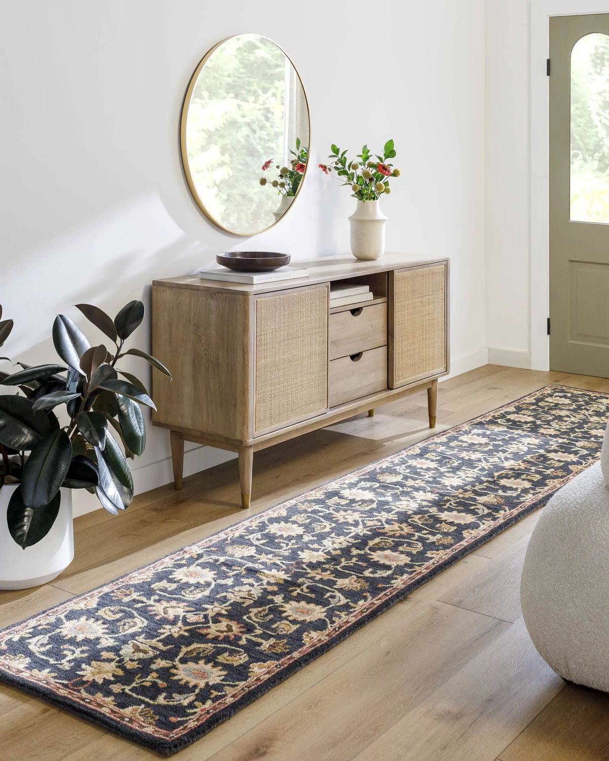 Kittredge Floral Black Wool Rug, installed in a room 2