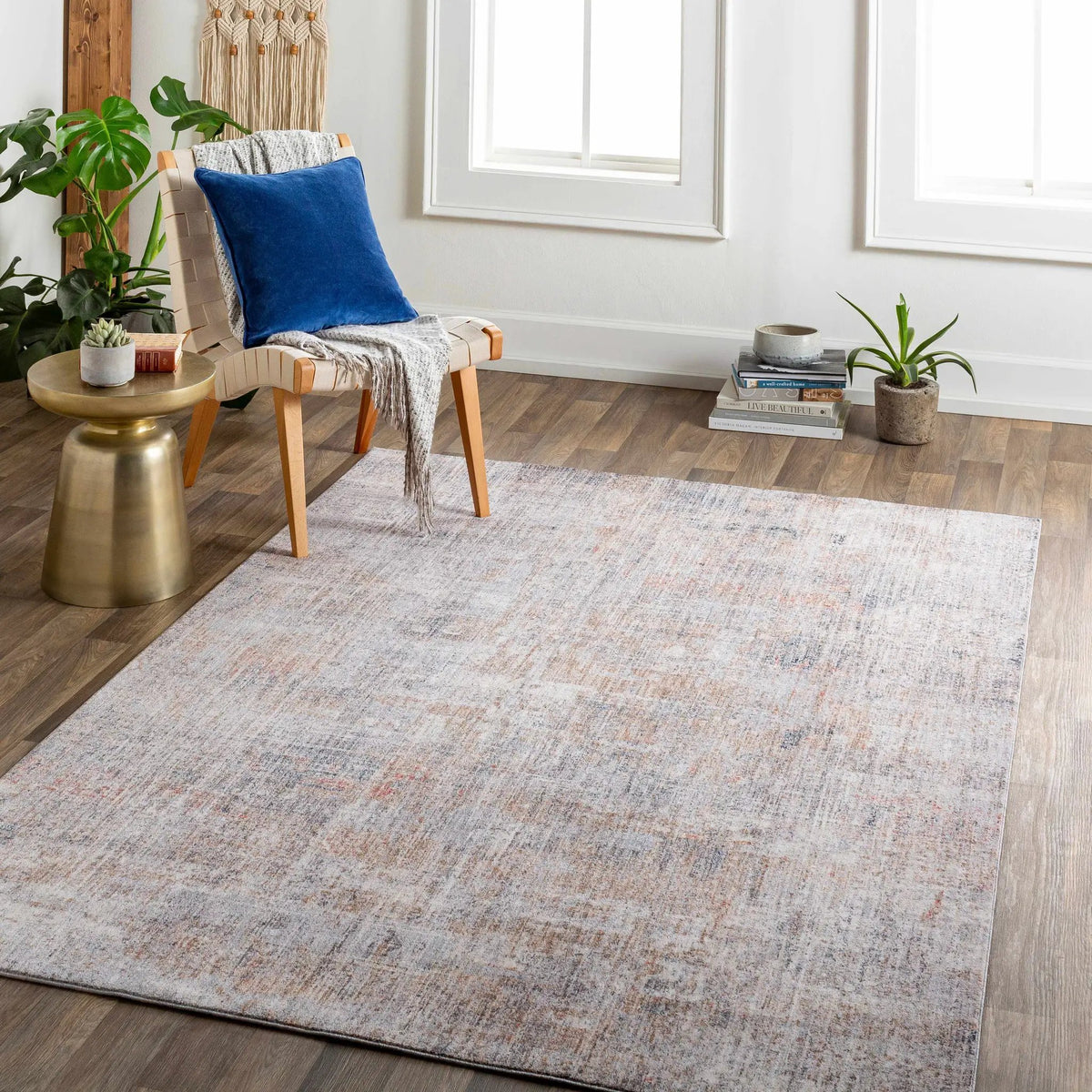 Llorente Area Rug - Clearance, installed in a room