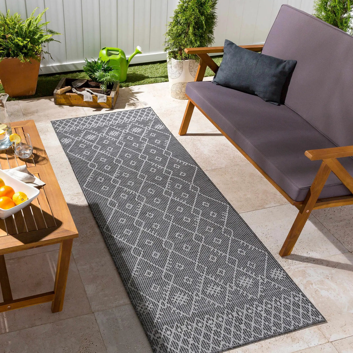 Lorena Charcoal Flatweave Trellis Outdoor Carpet - Clearance, installed in a room 2