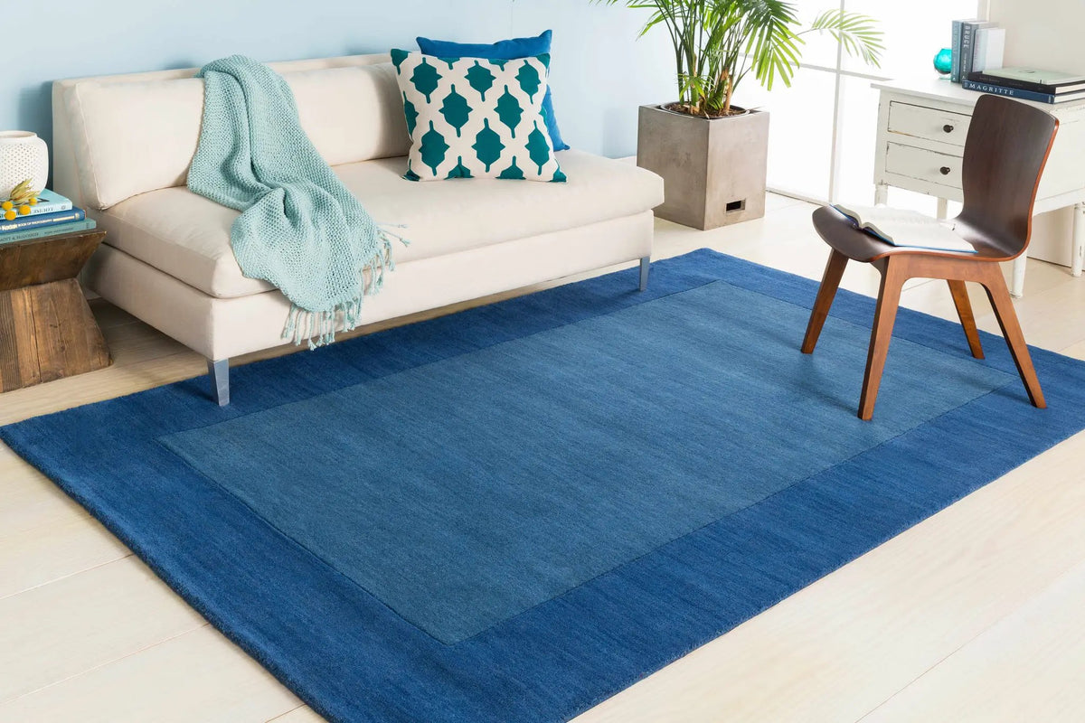 Macedon Blue Bordered Wool Rug, installed in a room 2