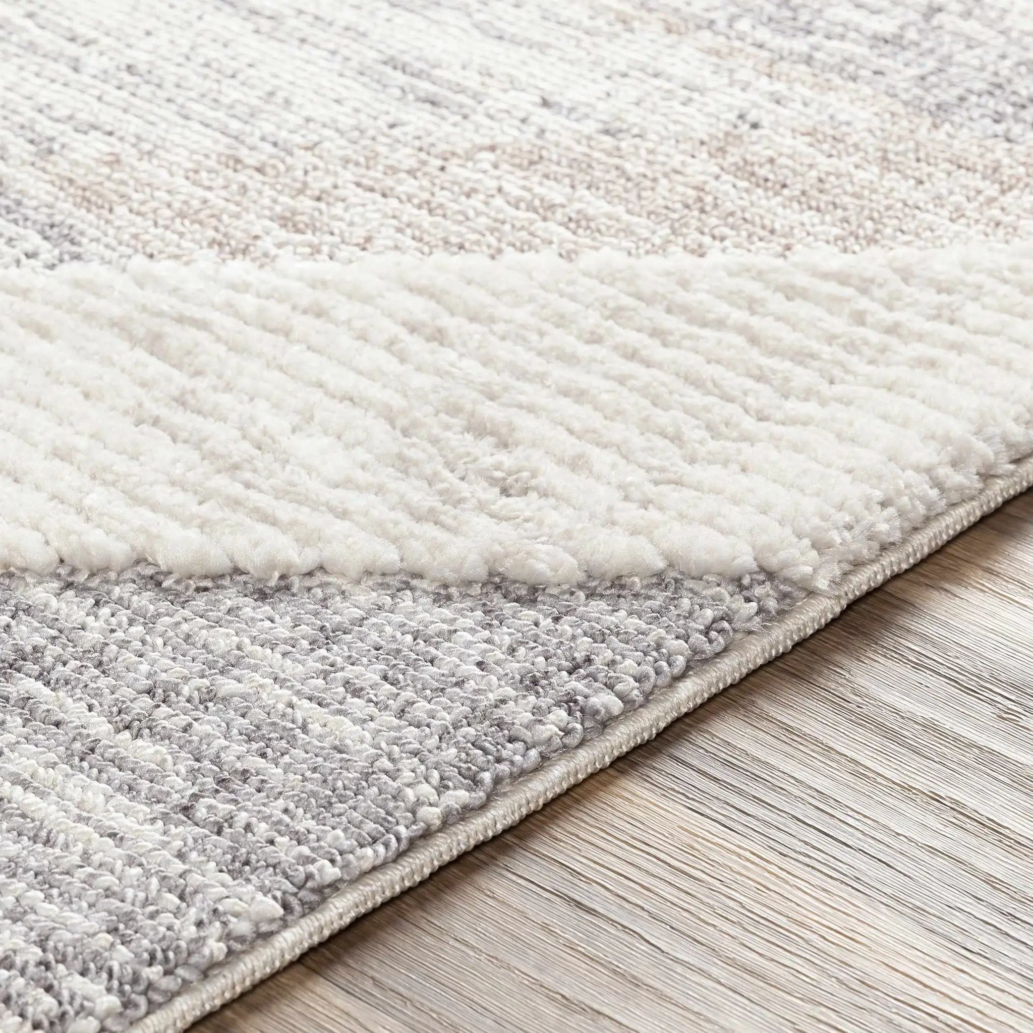 Magazine Geometric High/Low Pile Rug with Tassels - Clearance by Boutique Rugs