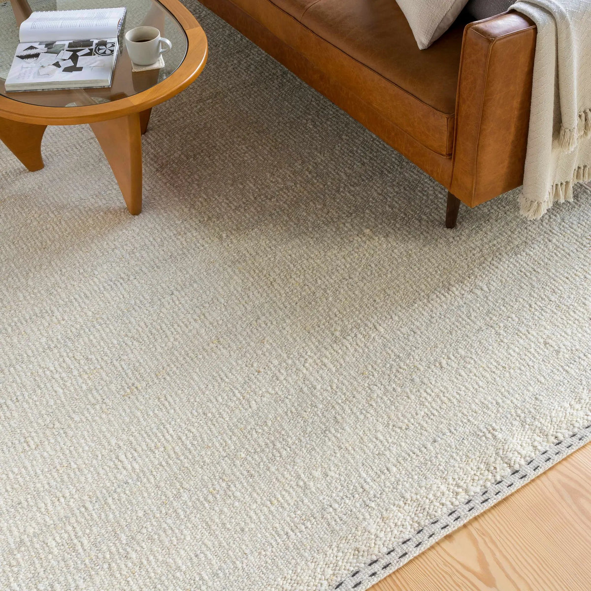 Yaniklar Cream Flat Woven Wool Rug, installed in a room 2