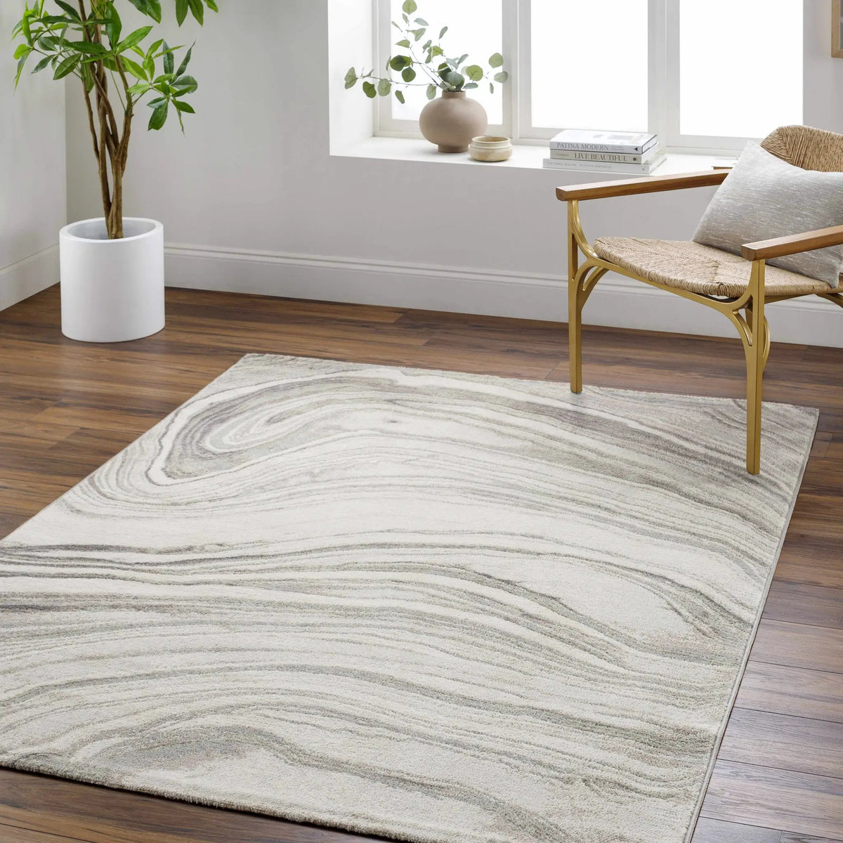 Mojil Area Rug - Clearance, installed in a room