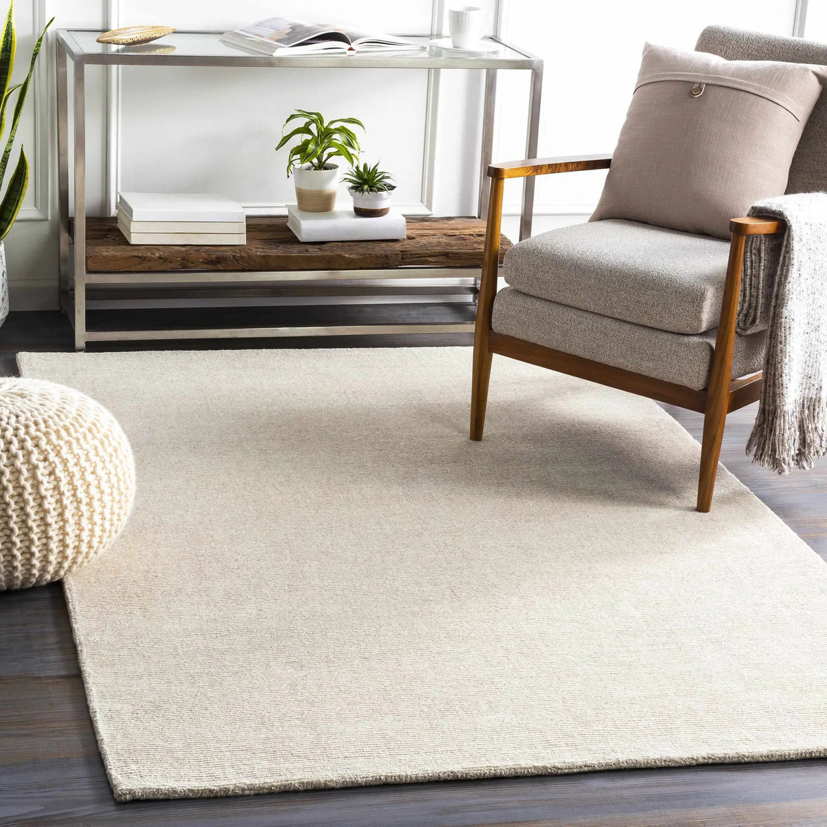 Mariba Ivory Wool Area Rug, installed in a room