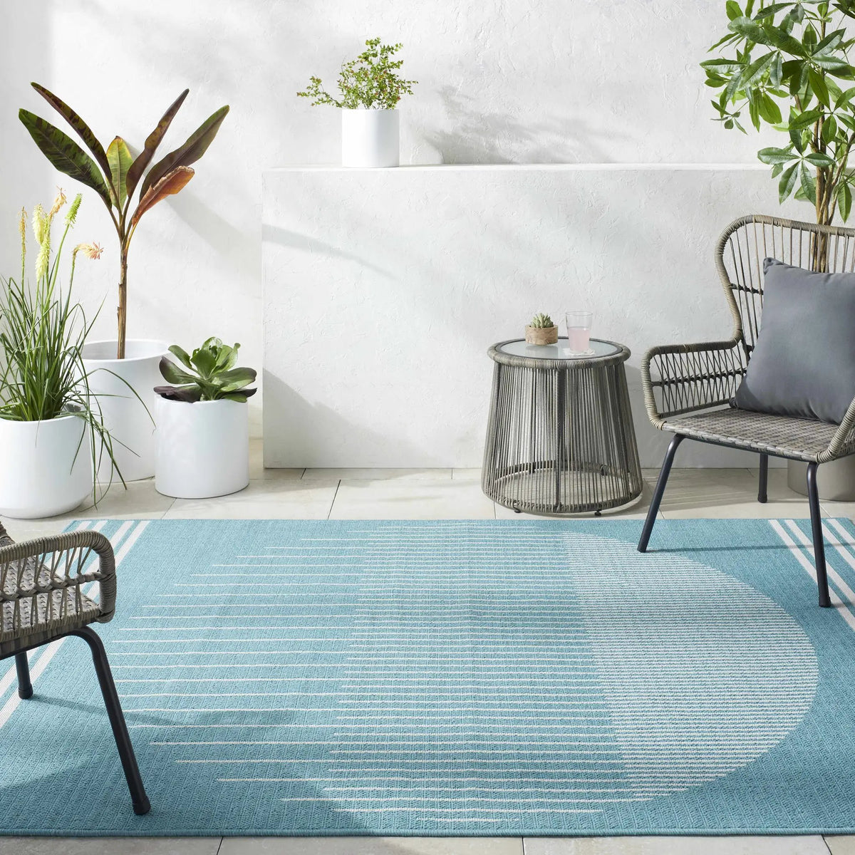 Nabil Aqua Outdoor Area Rug - Clearance, installed in a room