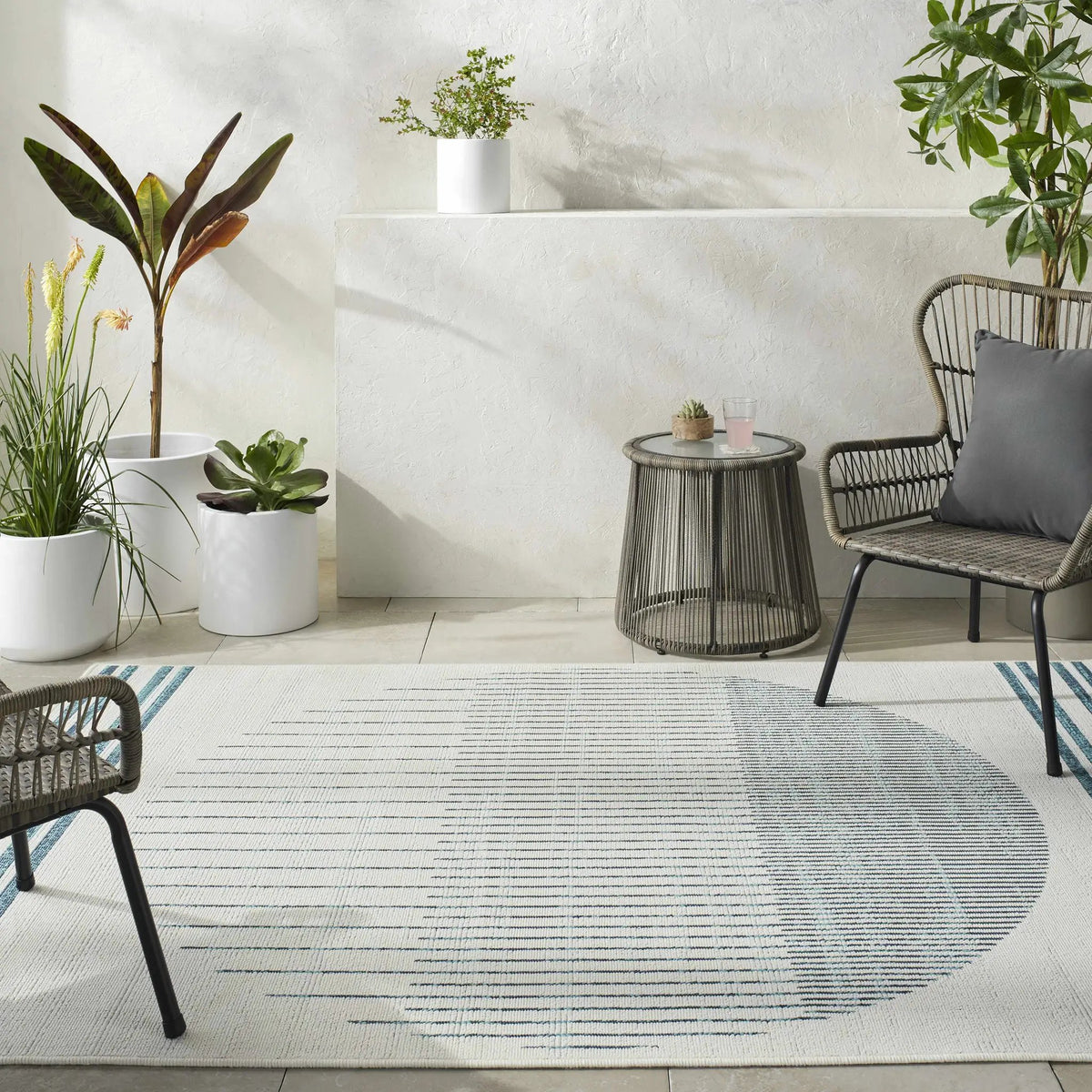 Nabil Slate Blue Outdoor Area Rug - Clearance, installed in a room