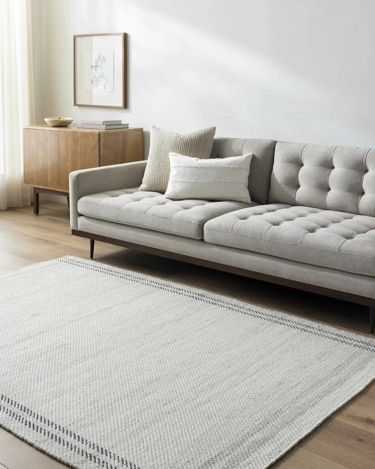 Nimue Ivory Wool Rug - Clearance, installed in a room