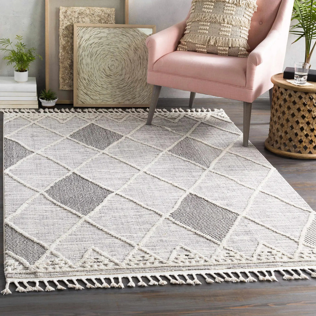 Norvelt High/Low Pile Rug with Tassels, installed in a room