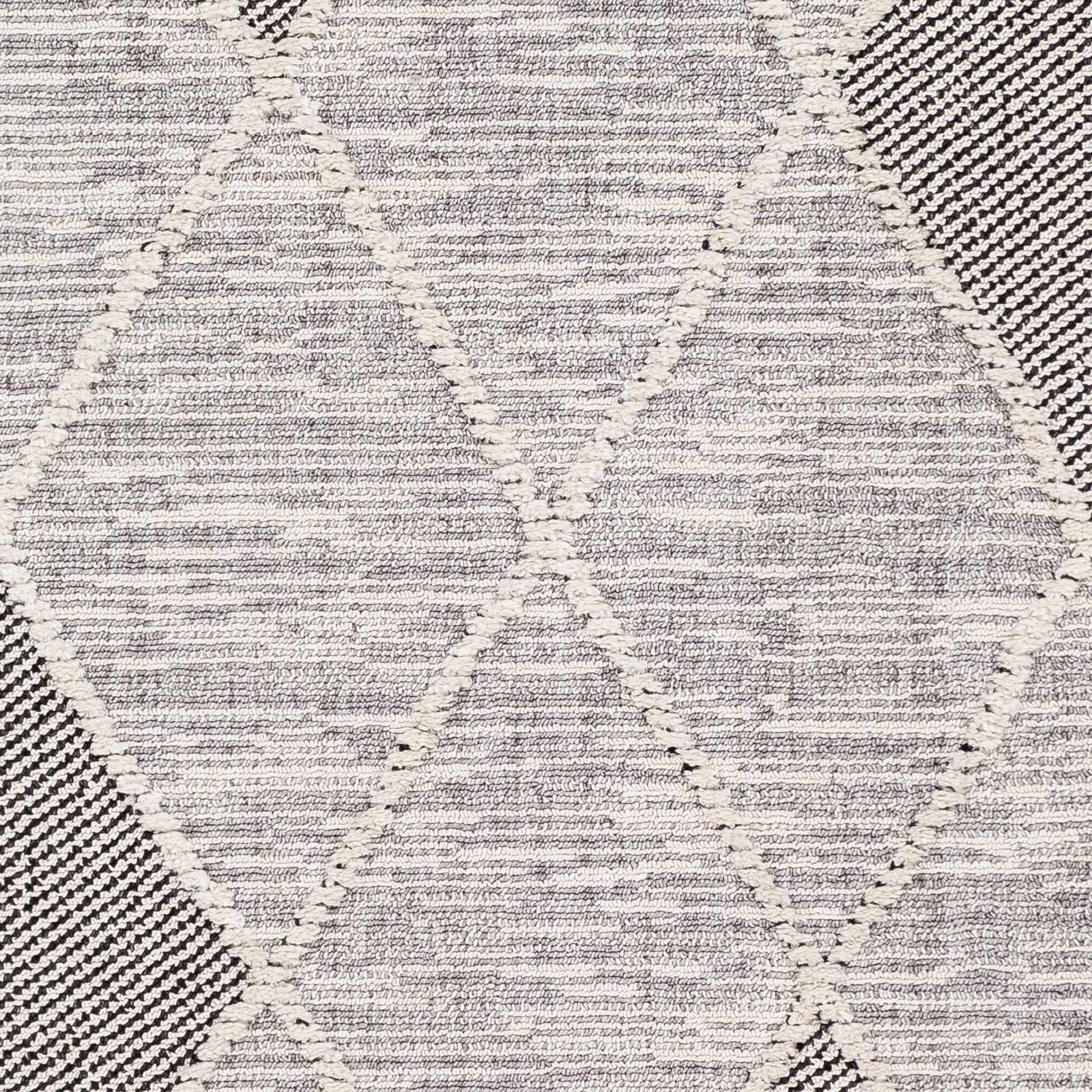 Norvelt High/Low Pile Rug with Tassels by Boutique Rugs