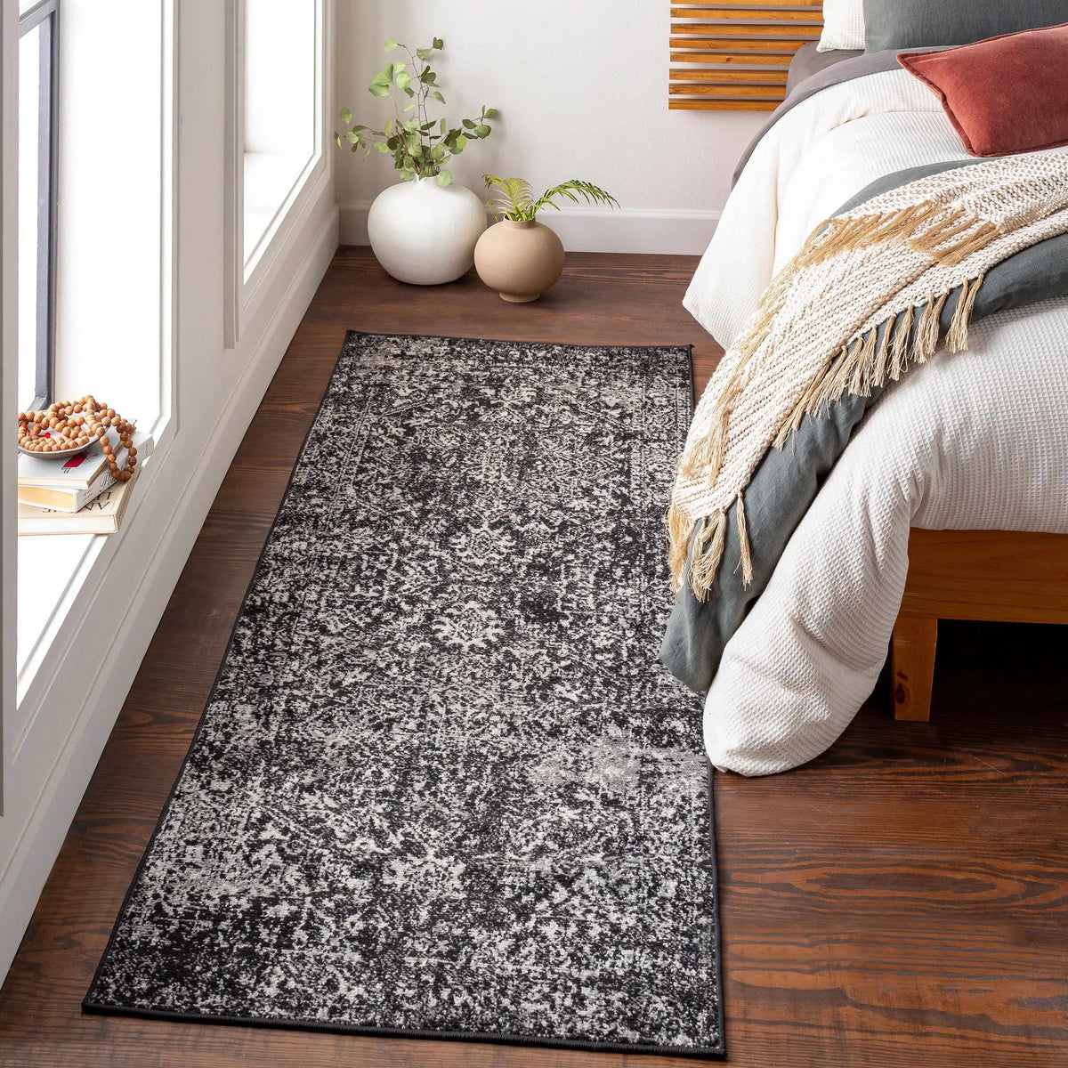 Rachel Black Area Rug, installed in a room 2