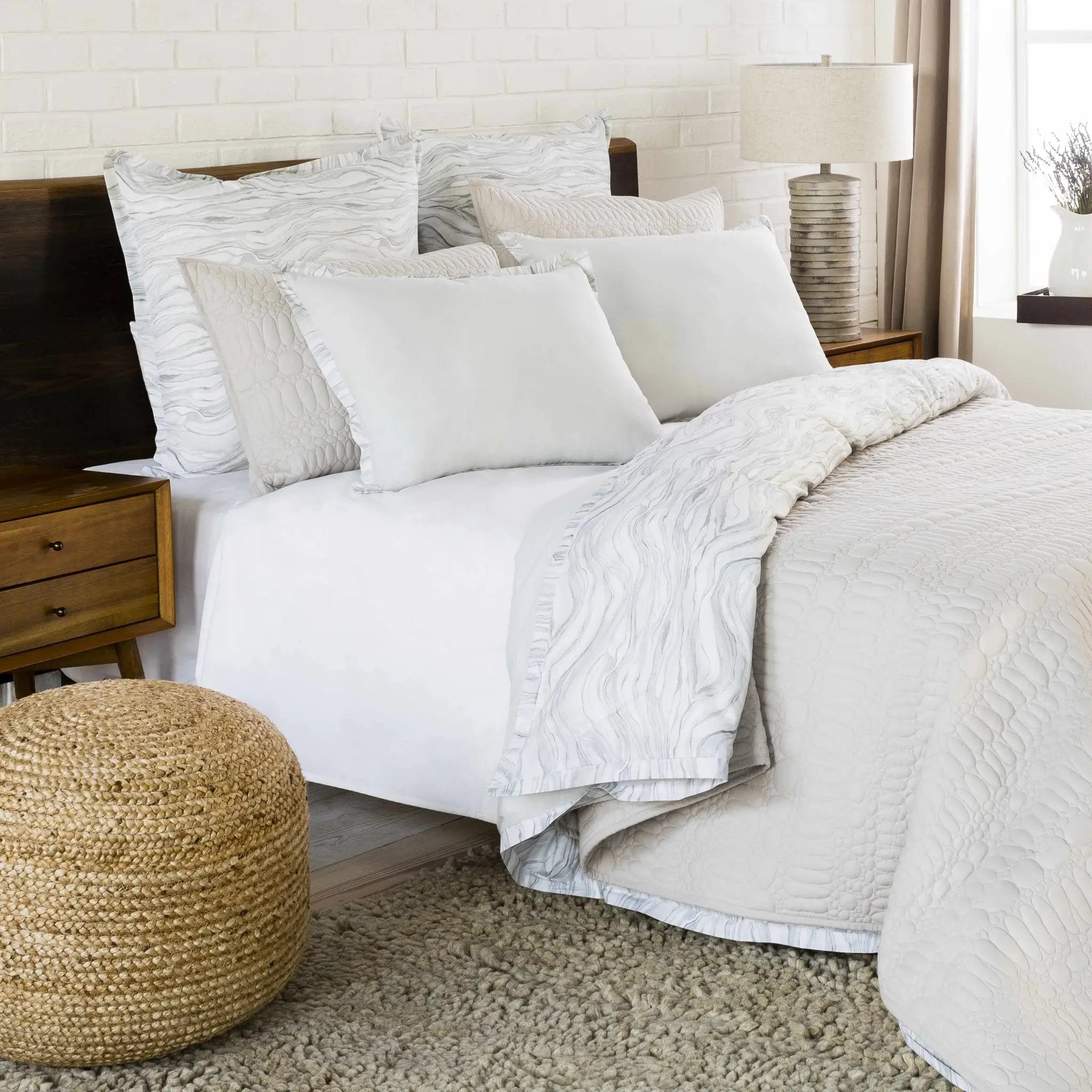 Kaumakani Knitted Jute Round Pouf by Boutique Rugs