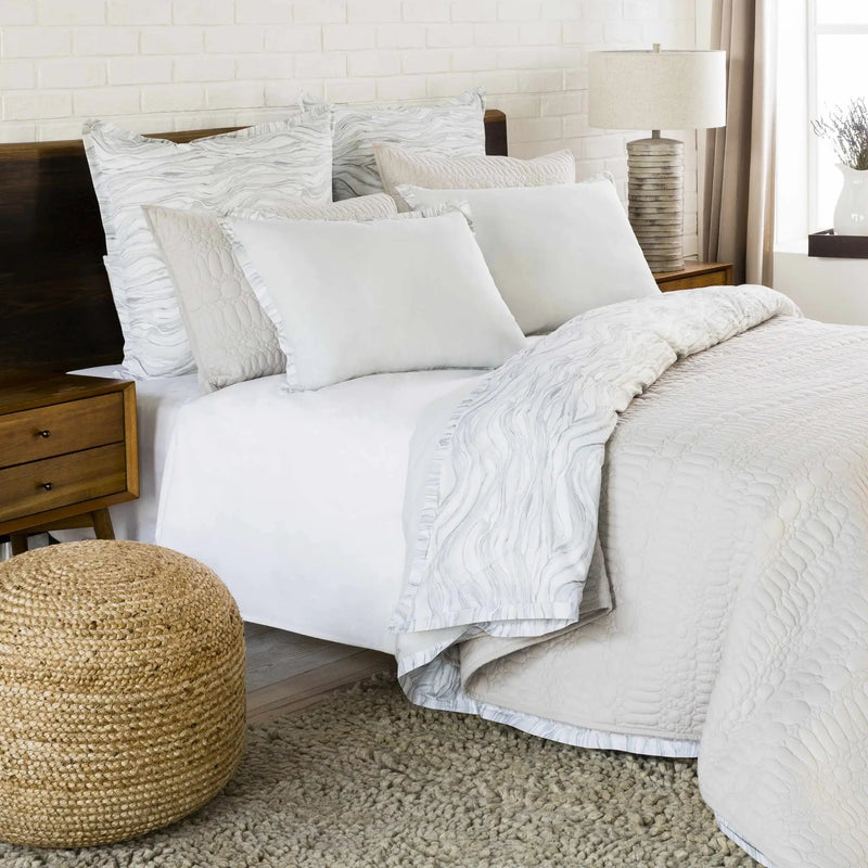 Kaumakani Knitted Jute Round Pouf by Boutique Rugs