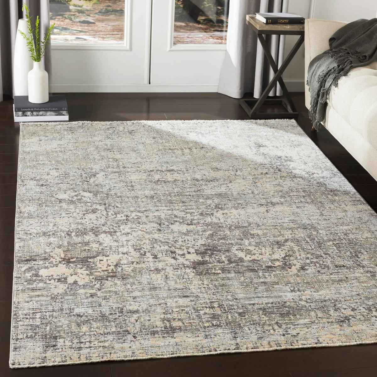 Penokee Carved Statement Rug, installed in a room