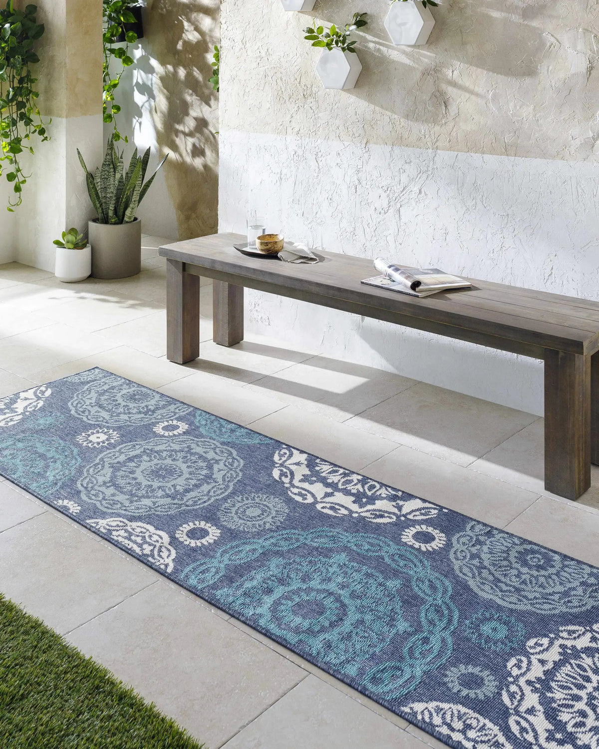 Reasnor Outdoor Area Rug - Clearance, installed in a room 3