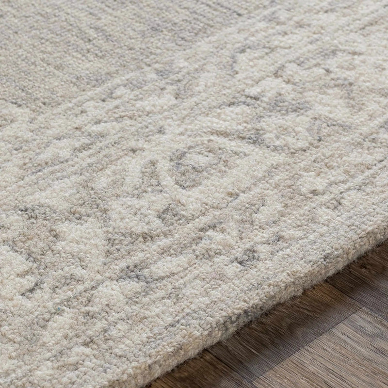 Roessleville Cream Wool Area Rug by Boutique Rugs