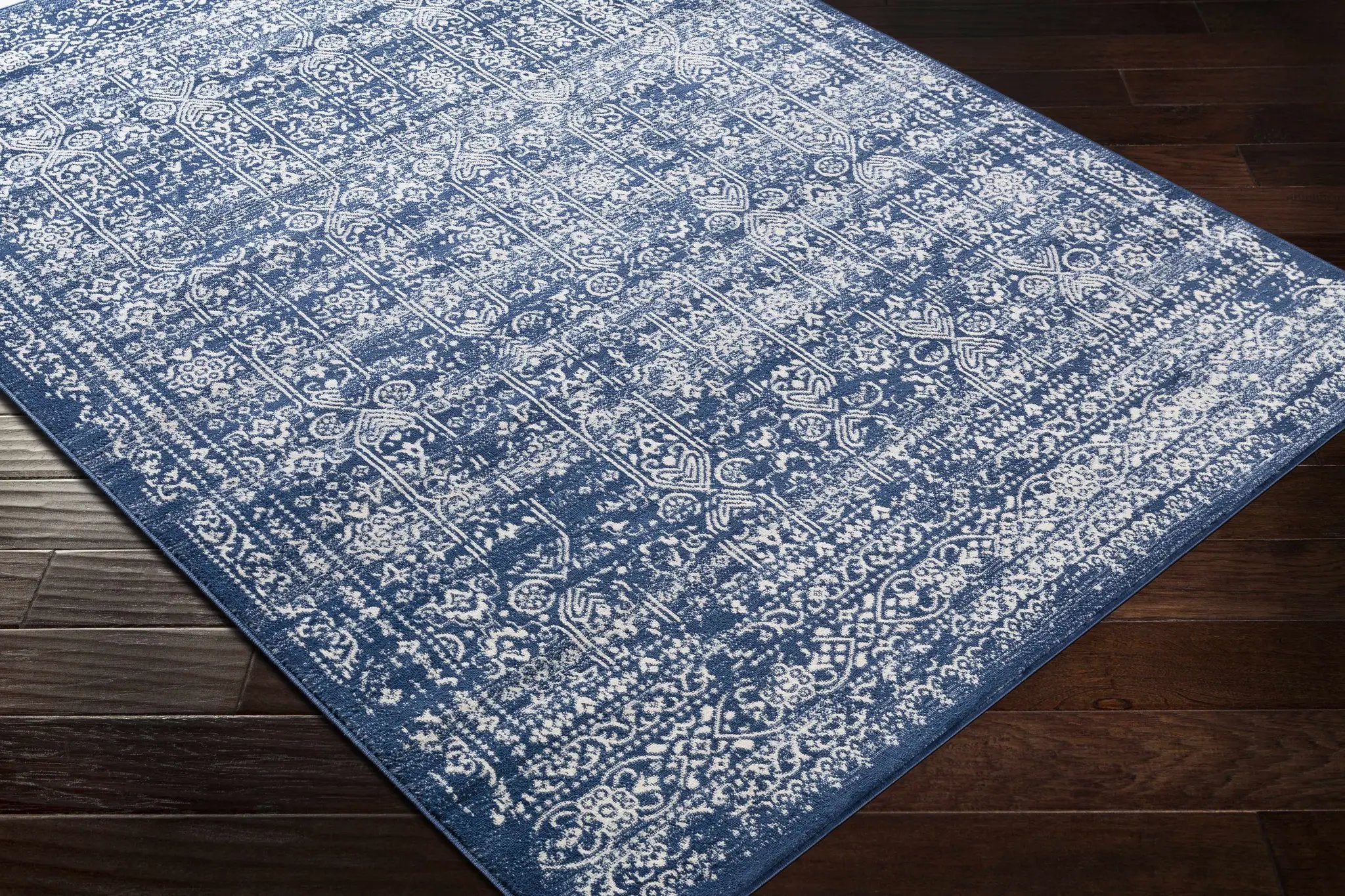 Michie Dark Blue Area Rug by Hauteloom