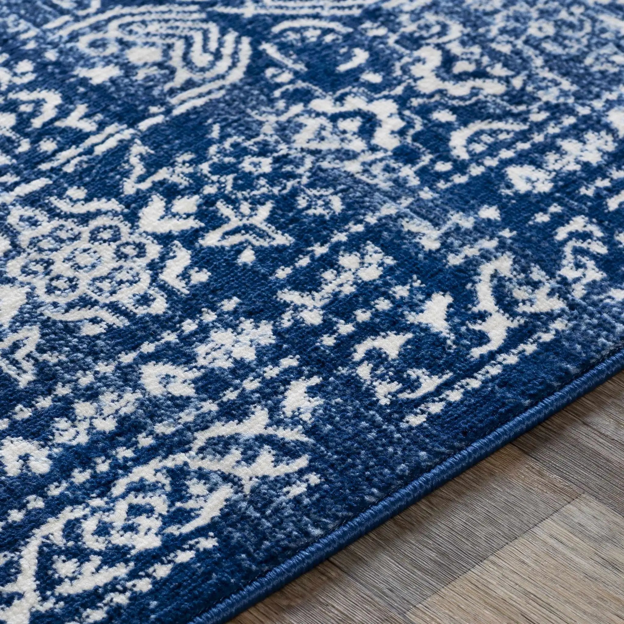 Michie Dark Blue Area Rug by Hauteloom