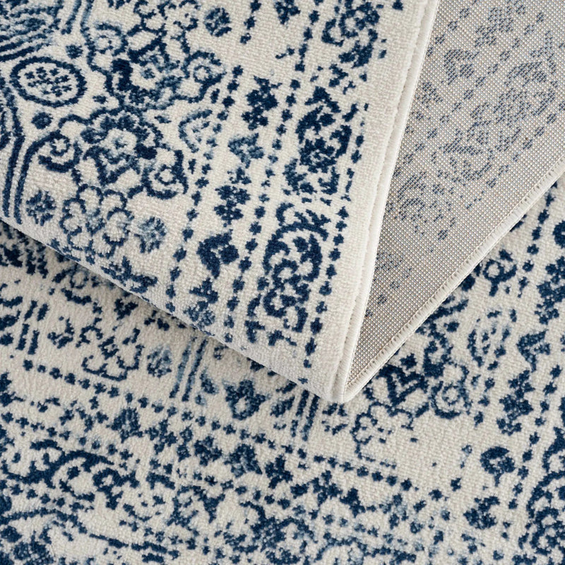 Michie Blue Area Rug by Hauteloom