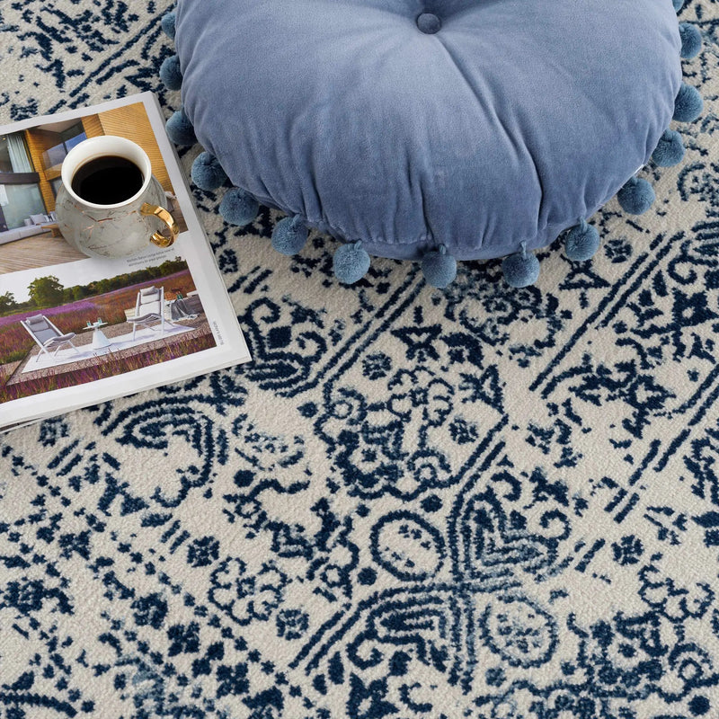Michie Blue Area Rug by Hauteloom