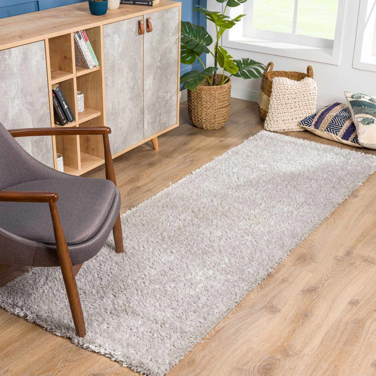 Lunaro Gray Subtle Wavy Abstract Modern Minimalist Polyester Machine Woven Area Rug - Clearance, installed in a room
