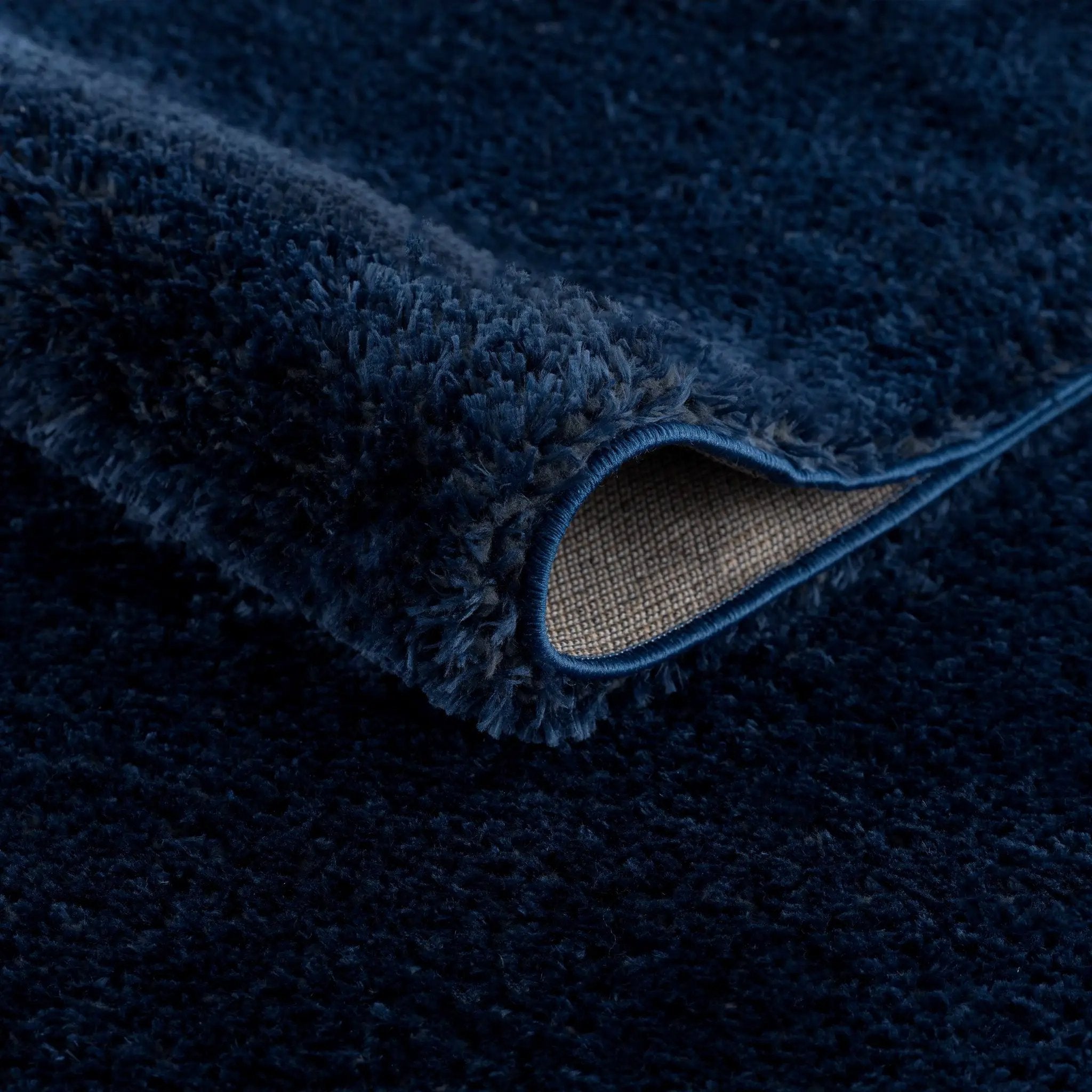 Navero Dark Blue Subtle Wavy Abstract Modern Minimalist Polyester Machine Woven Area Rug - Clearance by Boutique Rugs