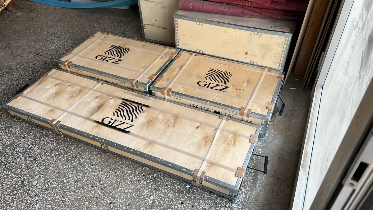 Luxurious Ivory Shaped Legs Epoxy Resin Dining Room Table, packed in its shipping crate