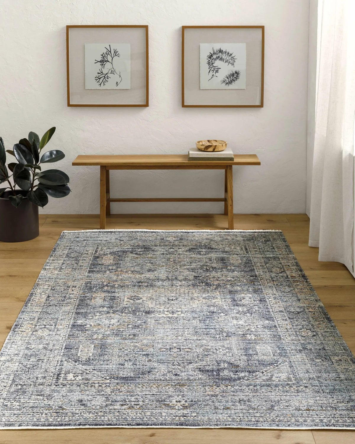 Margaret Outdoor Machine Woven Becki Owens x LIVABLISS BOMG-2301 Washable Area Rug, installed in a room