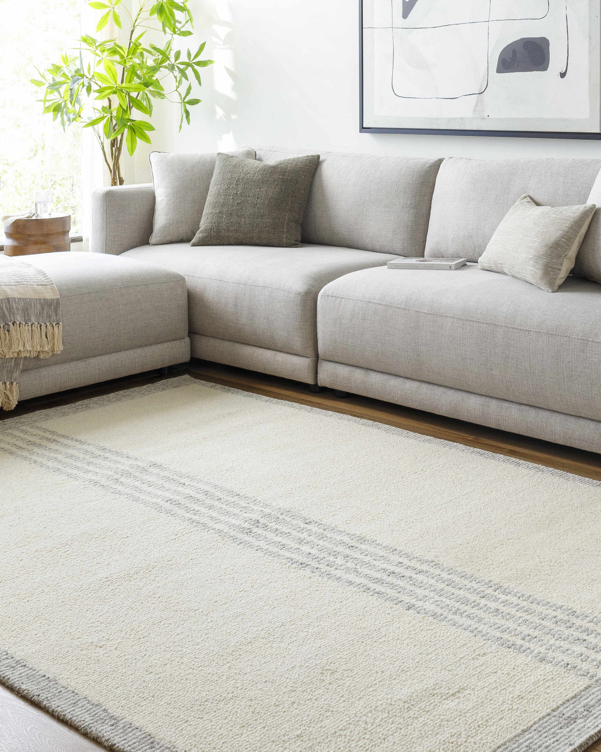 Ande Cream Area Rug - Clearance, installed in a room