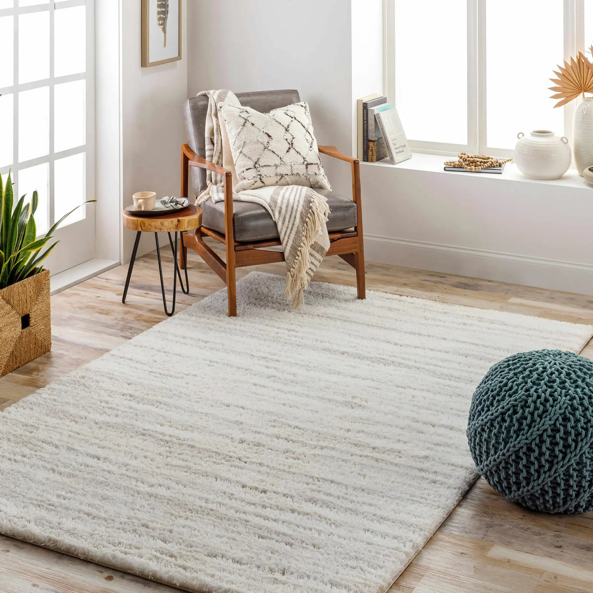 Ajeya Area Rug, installed in a room