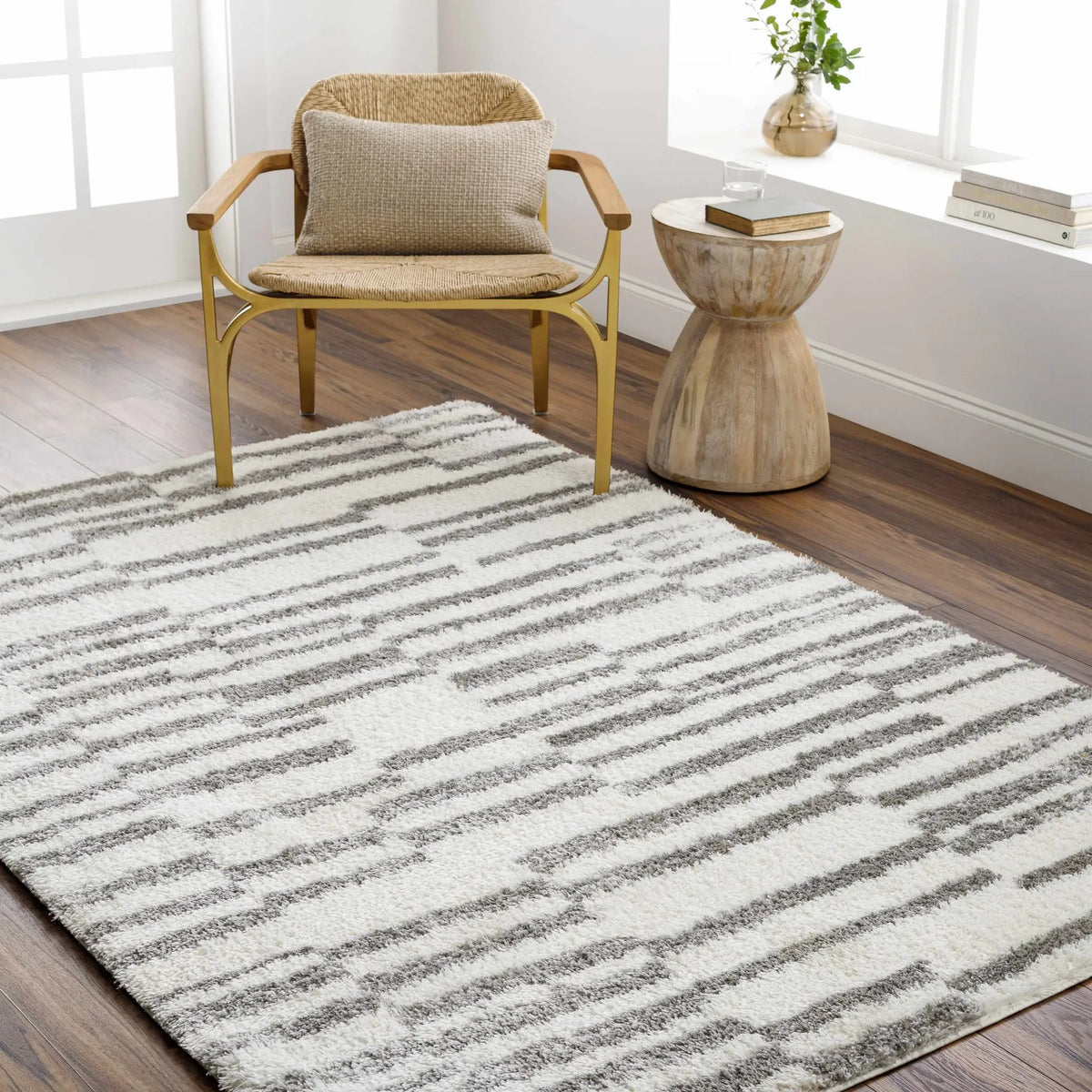 Kuron Area Rug, installed in a room