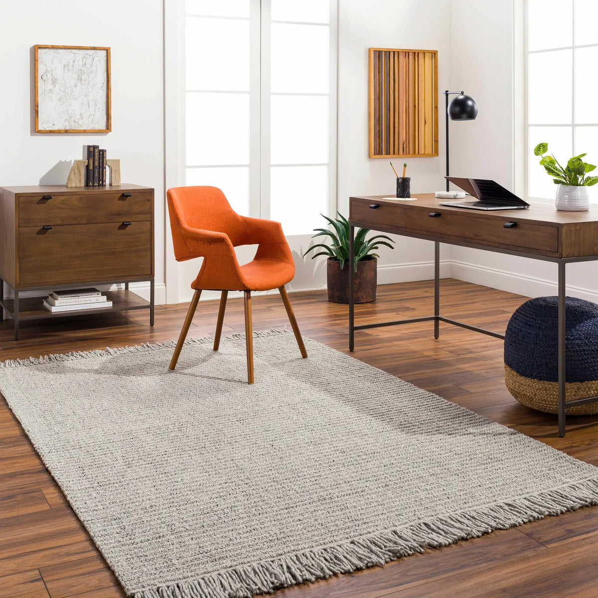 Desma Taupe Area Rug - Clearance, installed in a room