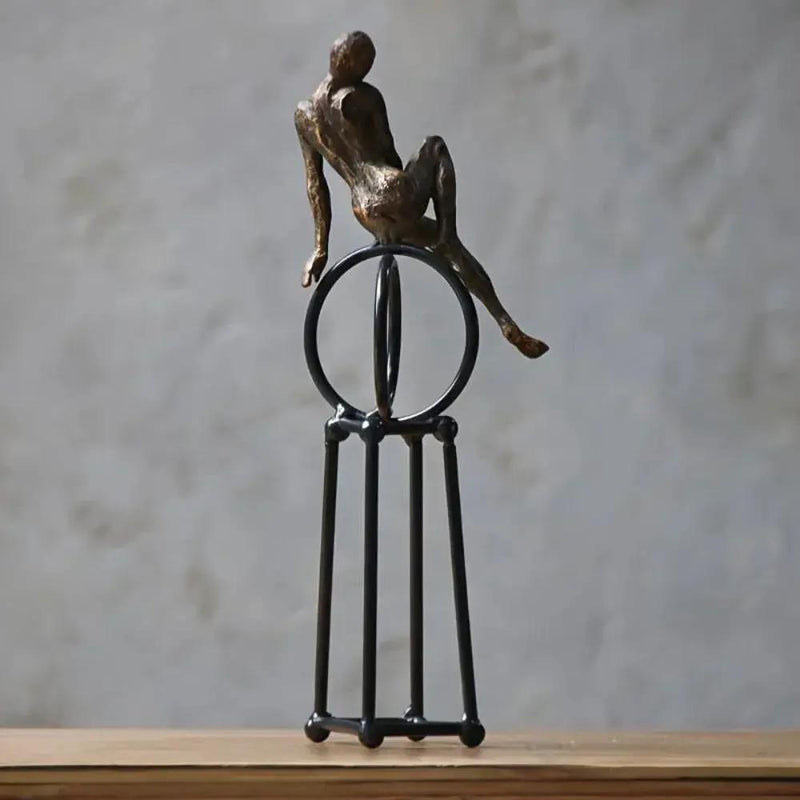Abstract Seated Figure Sculpture on Geometric Stand – Modern Iron Table Decor by House Of Avana