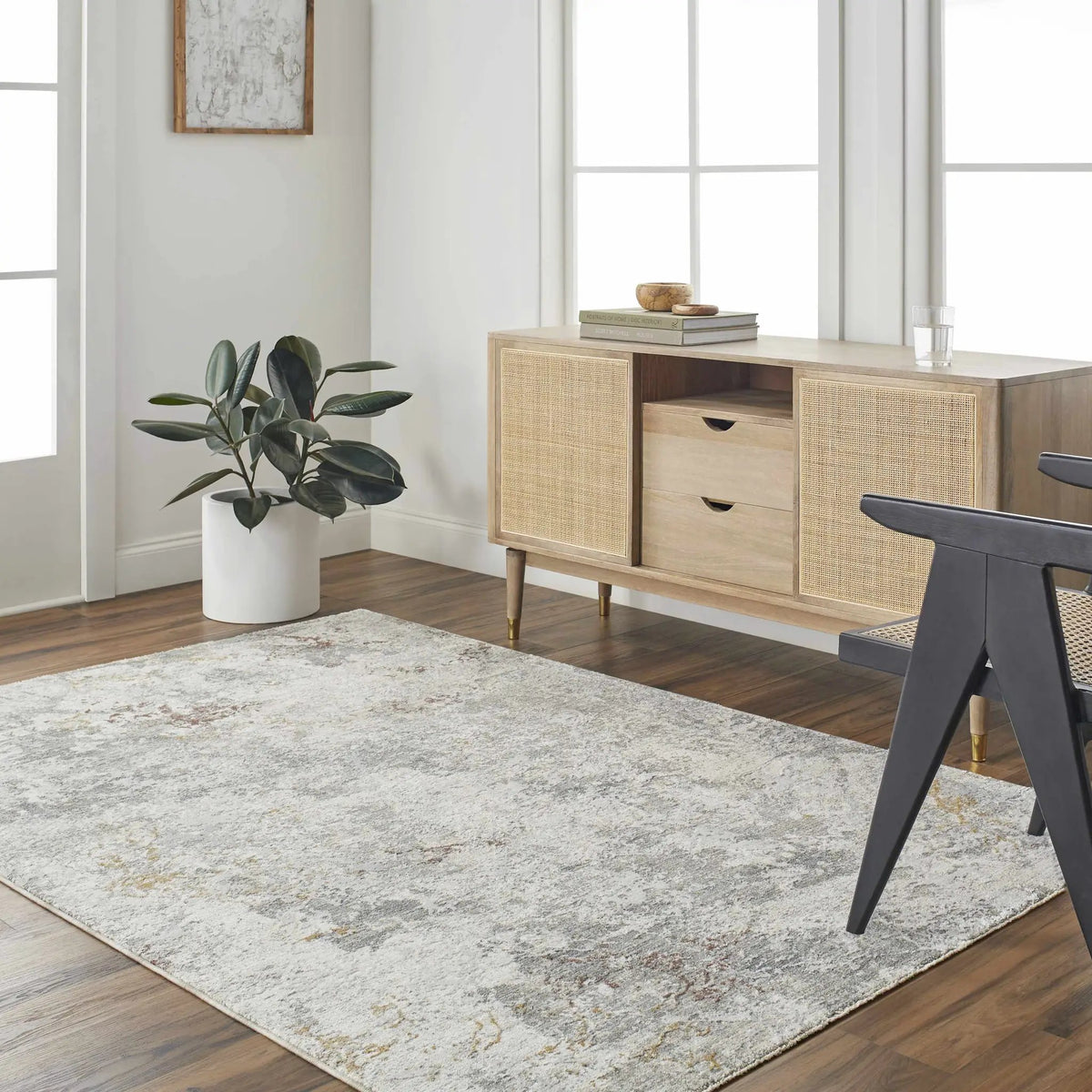 Edana Textured Rug with Fringes, installed in a room