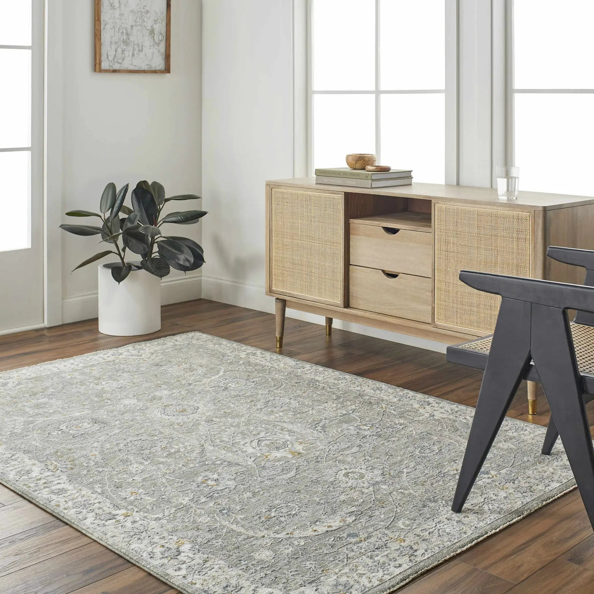 Gauge Gray Blue Textured Rug with Fringes, installed in a room