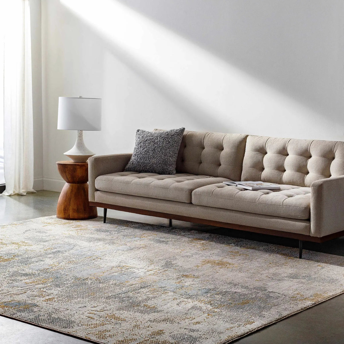 Gryta Textured Rug with Fringes, installed in a room