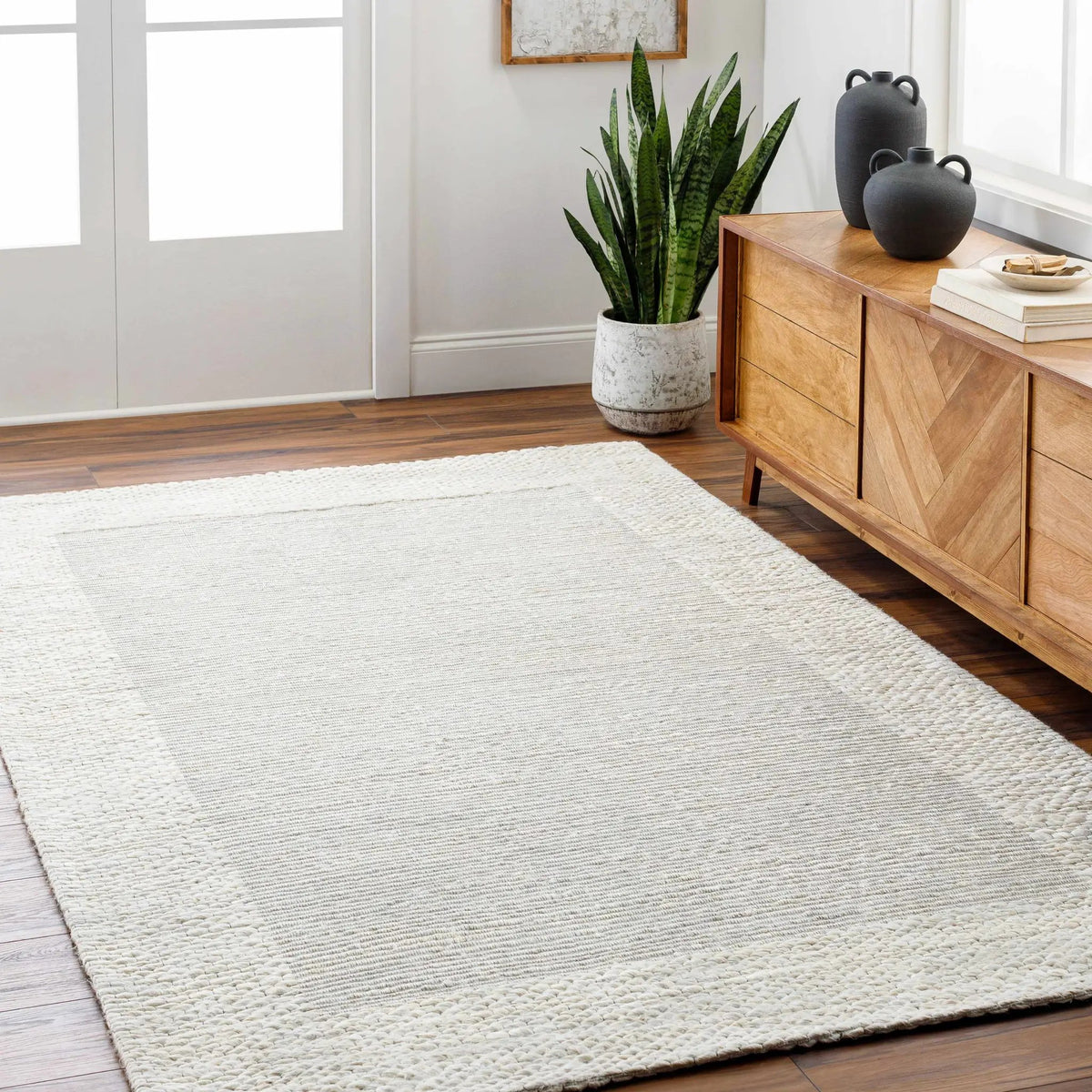 Jojen Off White Jute Area Rug - Clearance, installed in a room