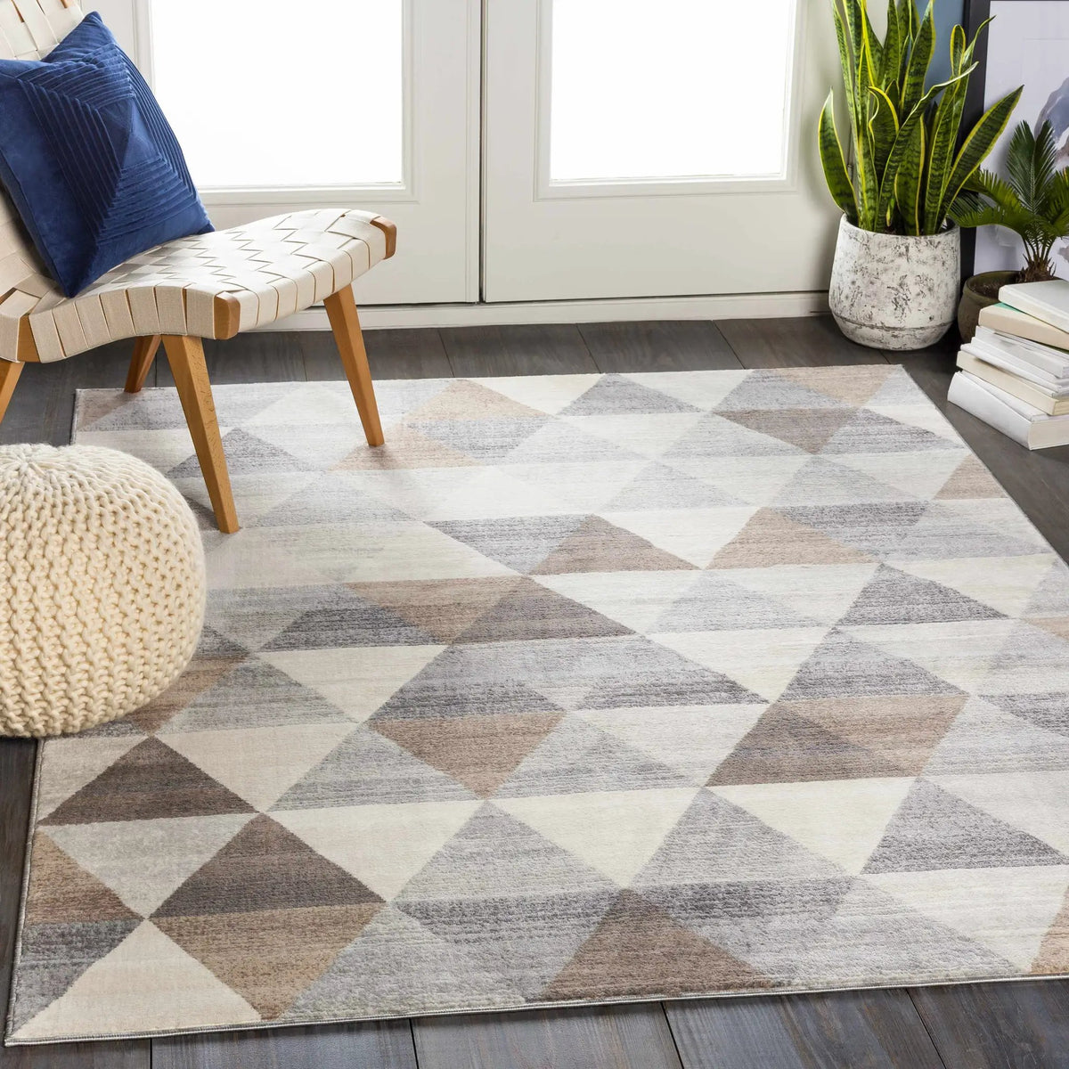 Sells Gray&Brown Triangles Area Carpet, installed in a room