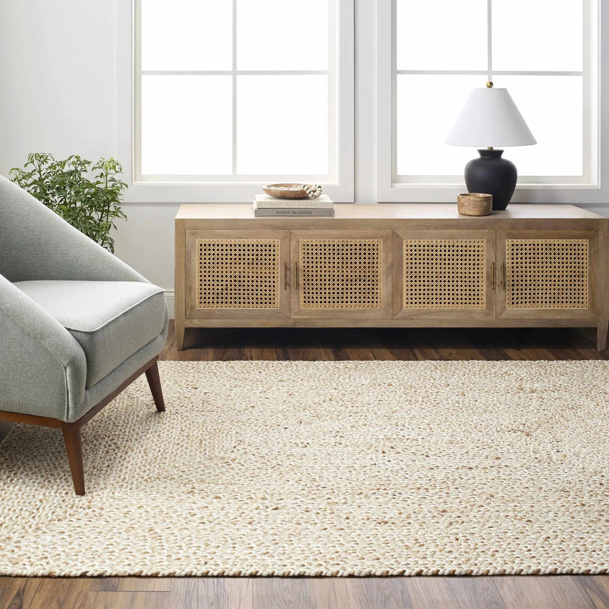 Elkie Cream Jute Area Rug - Clearance, installed in a room