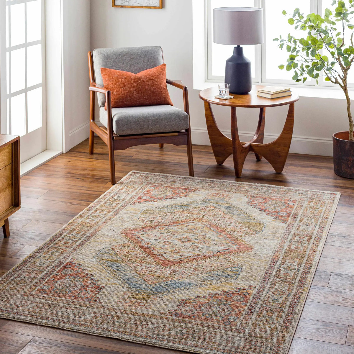 Moya Tan Rich Textured Traditional Rug, installed in a room