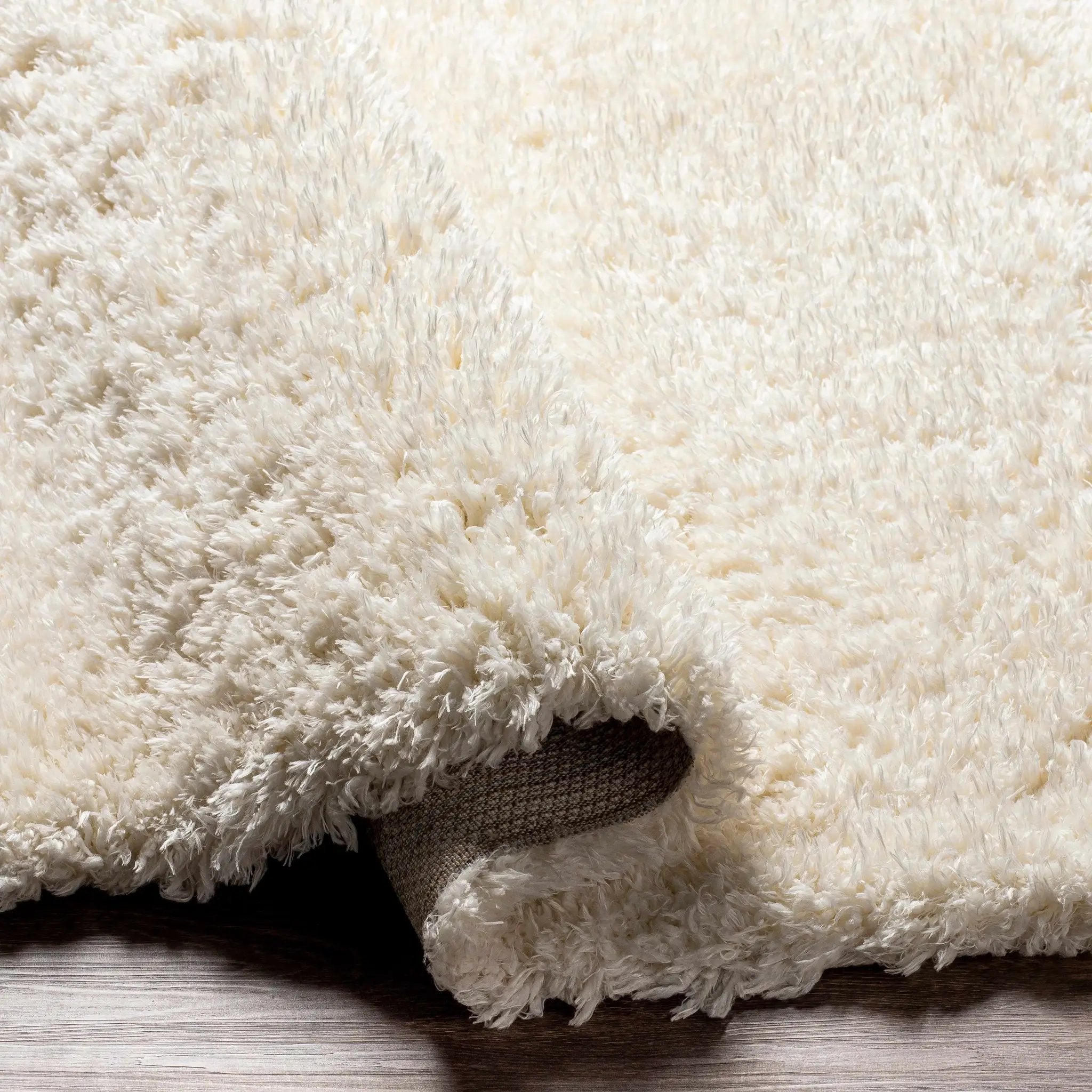 Siari Solid Cream Plush Rug by Boutique Rugs