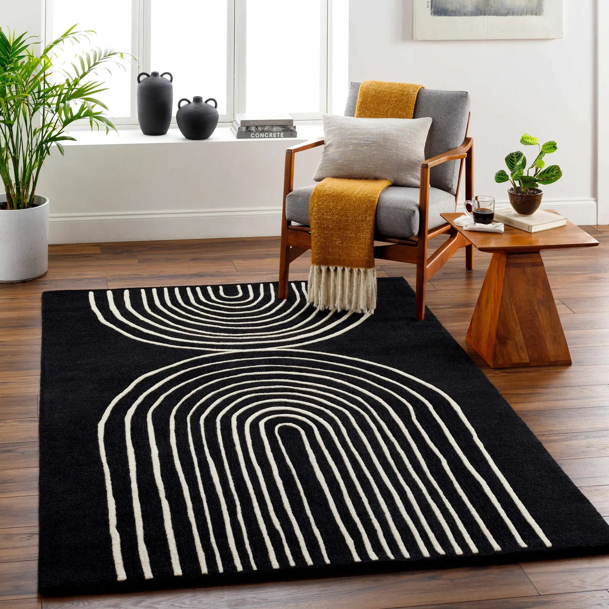 Fuat Black Wool Rug, installed in a room 2