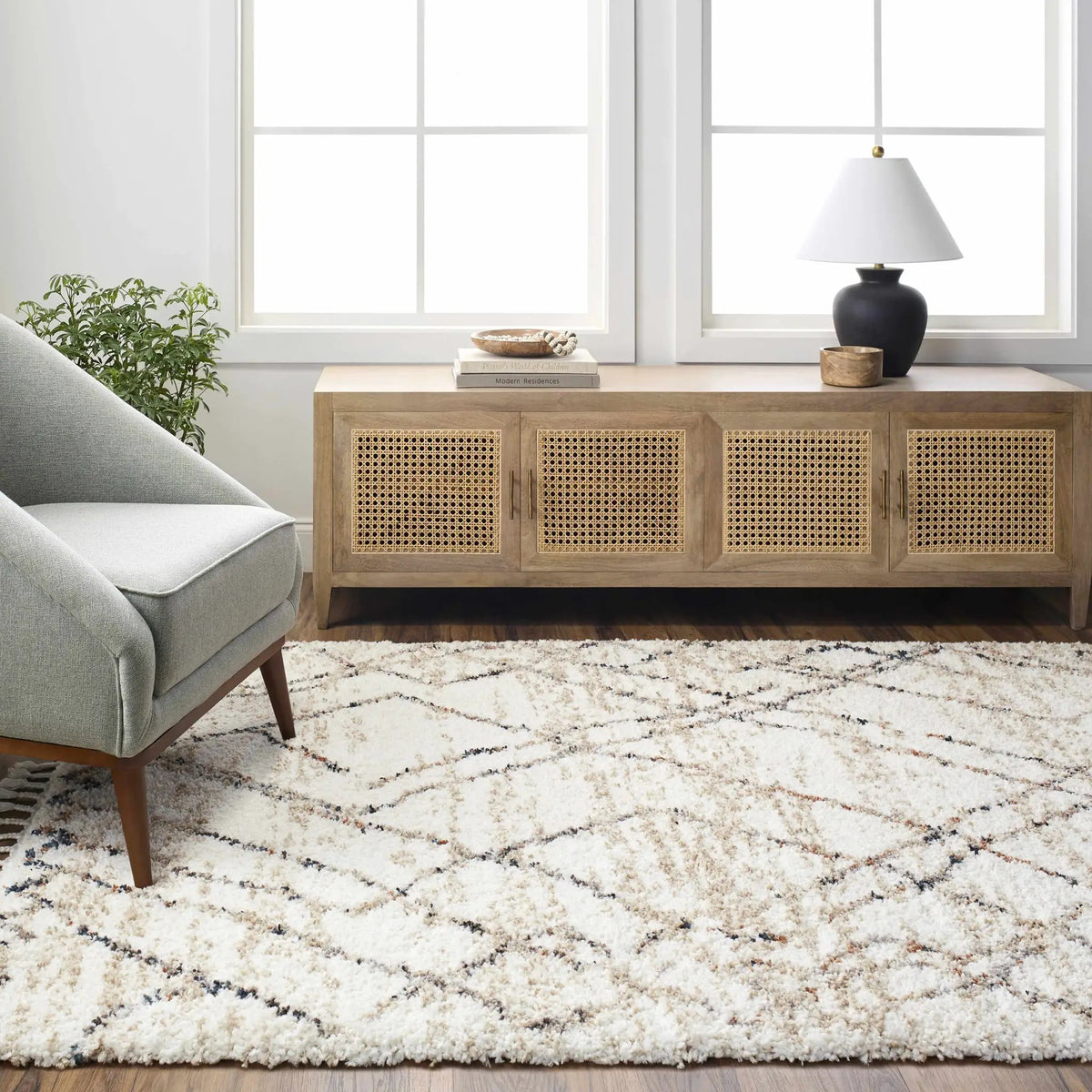 Hersz Cream Area Rug - Clearance, installed in a room