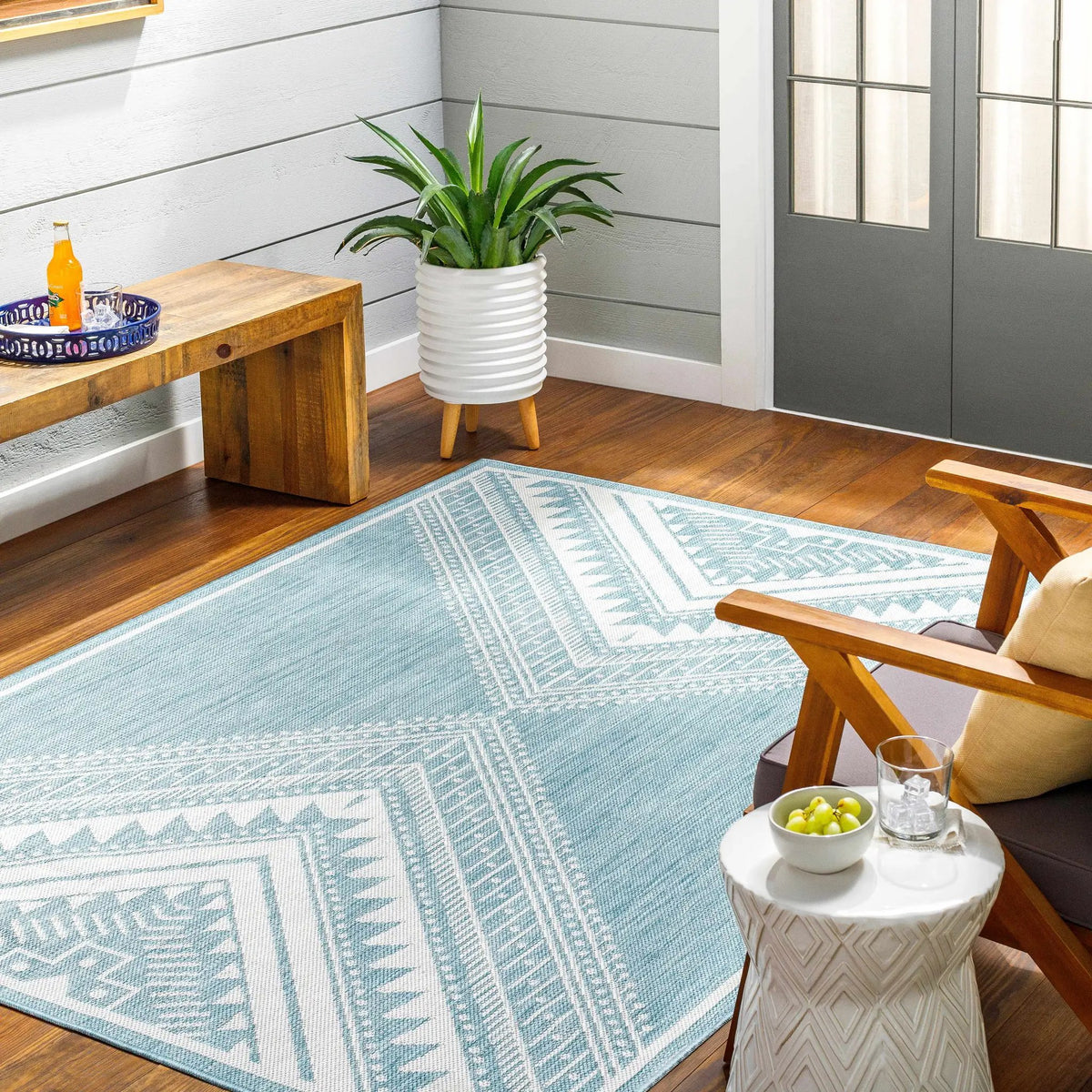 Deana Blue Outdoor Area Rug - Clearance, installed in a room